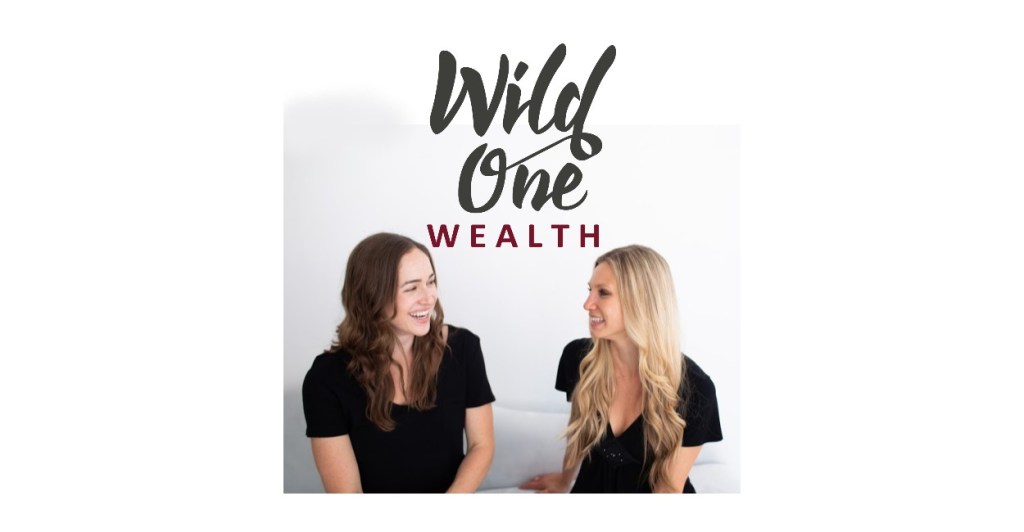 Founders of Wild One Wealth, Alison and Silvi sitting in front of the logo of their financial education company