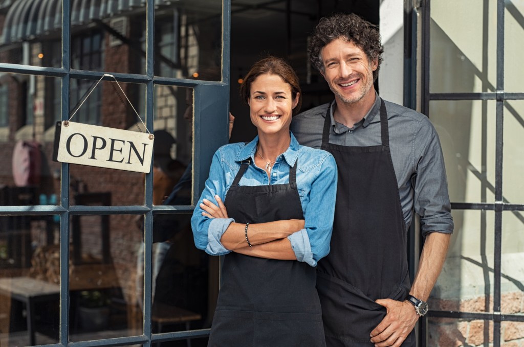 Two small business owners enjoy the advantages of a partnership