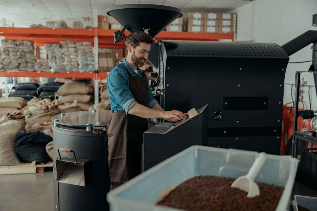 A man considers dissolving a corporation while grinding coffee beans